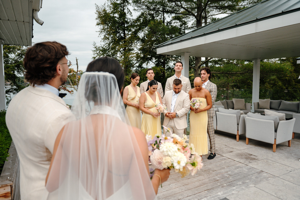 Wedding party first look with bride and groom. Wedding at Ripplecove Hotel & Spa
